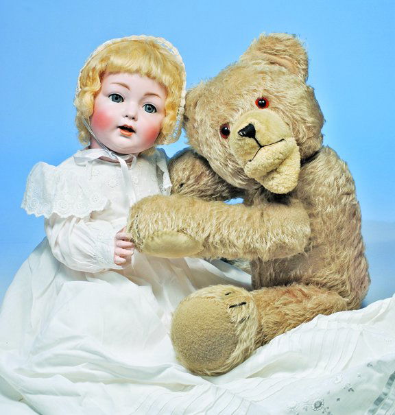 KONIG & WERNICKE GERMAN BISQUE CHARACTER BABY. Ma: KONIG & WERNICKE GERMAN BISQUE CHARACTER BABY. Marks: Made in Germany 98. 22". Bisque socket head, blue sleep eyes, original applied upper lashes and painted lashes, feathered brows, breather nostrils