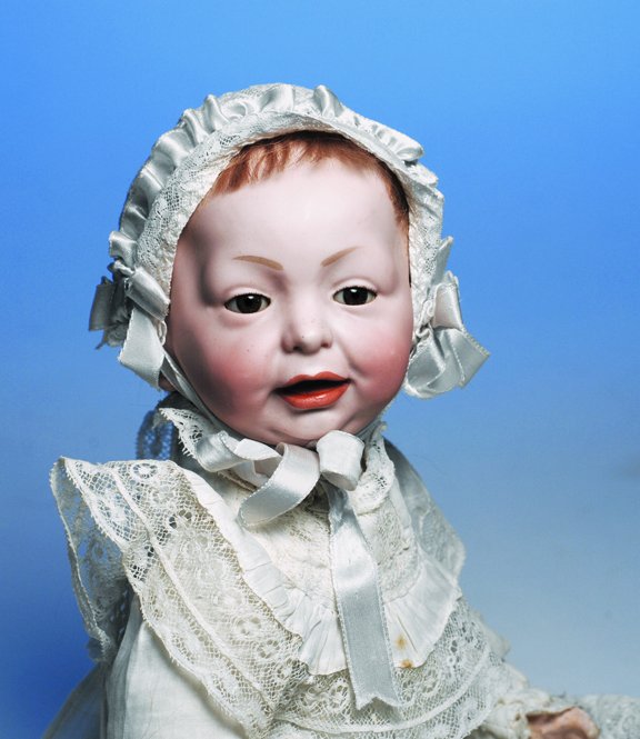 KAMMER & REINHARDT GLASS-EYED. GERMAN BISQUE "KAIS: KAMMER & REINHARDT GLASS-EYED. GERMAN BISQUE "KAISER BABY". Marks: 36. 15". Bisque socket head, brown glass sleep eyes, painted short, thick lashes, tapered brows, open/closed mouth, modeled detail be