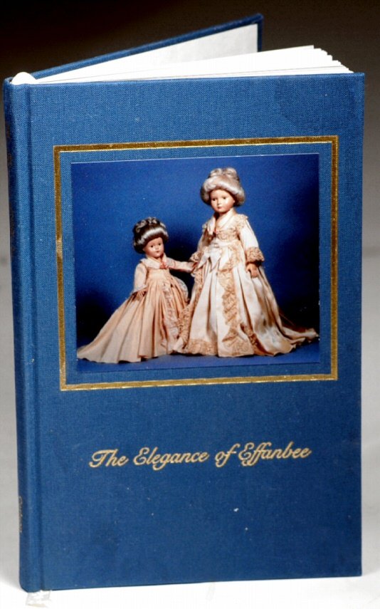 "ELEGANCE OF EFFANBEE" BOOK BY NANCY CARLSON: A limited edition book, #649 of 750, containing color plates, text and statistics regarding the manufacture and history of the Effanbee Historical Dolls; signed by Nancy and David Carlson.