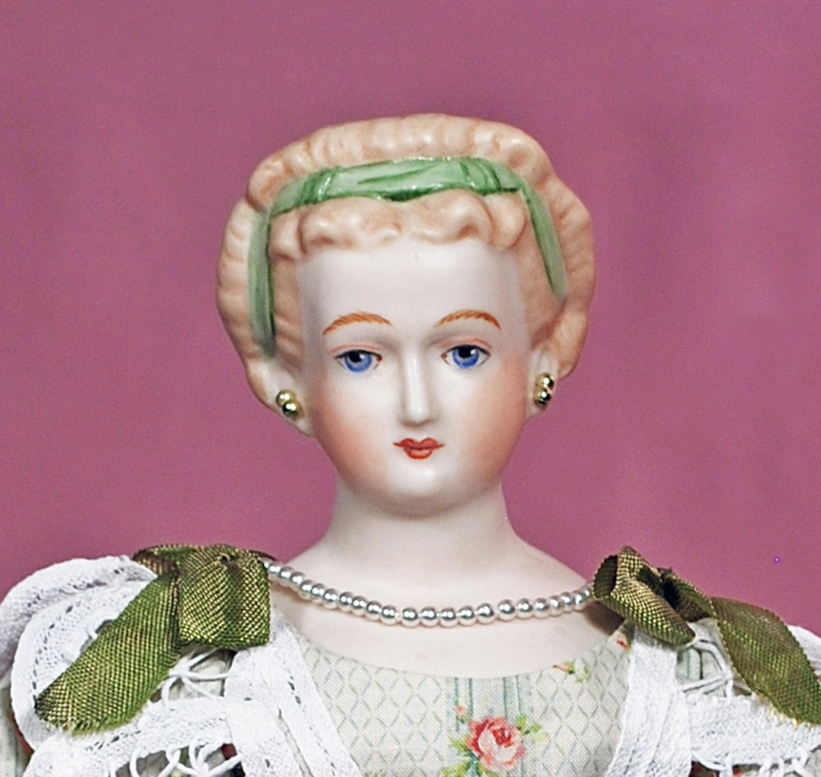 ARTIST PARIAN LADY: ARTIST PARIAN LADY. 16". Bisque shoulderhead with sculpted blonde hair adorned with painted green hair ribbon, painted features, pearl necklace and earrings, cloth body with bisque lower limbs, well-d
