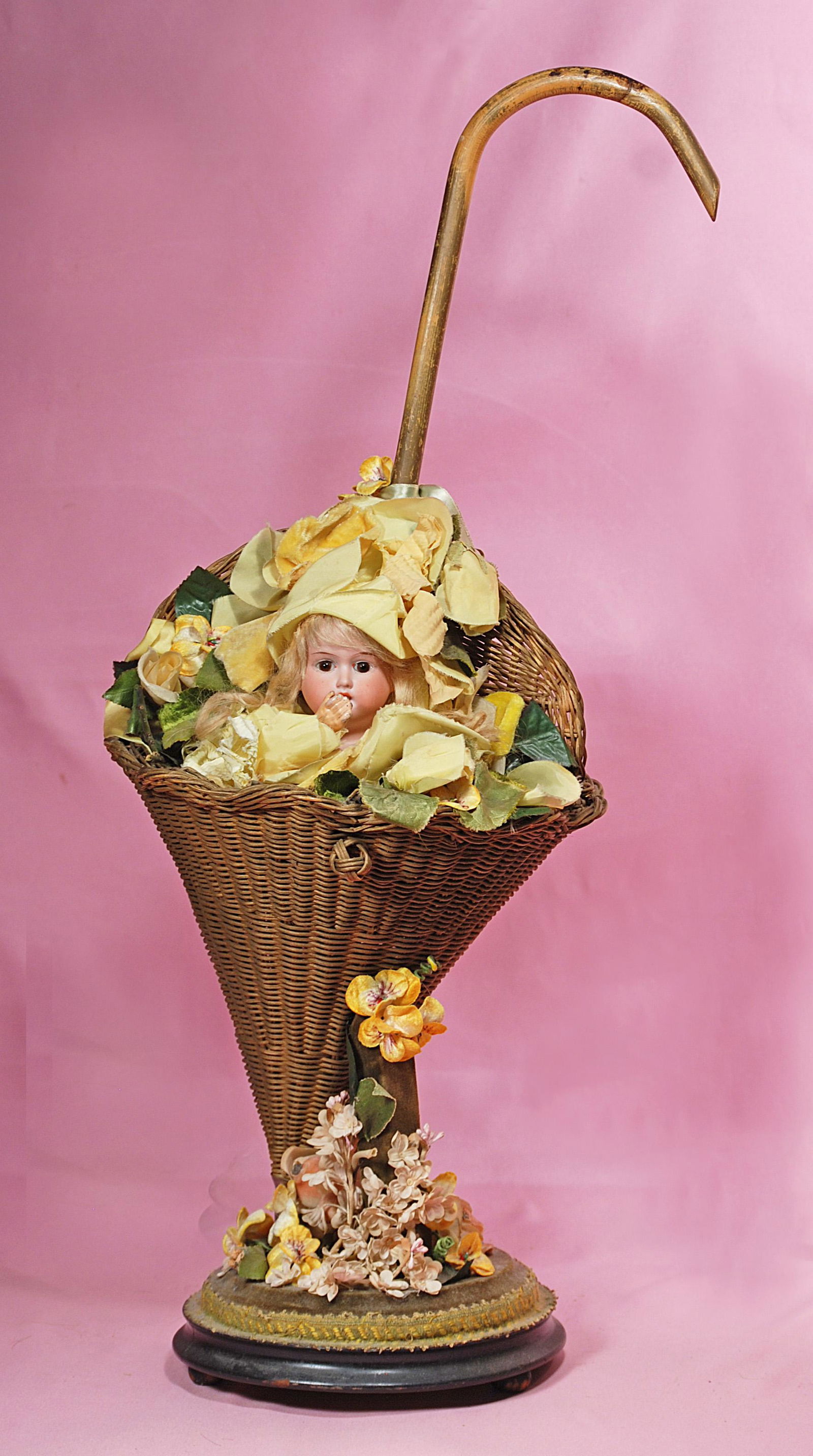 WICKER UMBRELLA BASKET WITH BISQUE DOLL HEAD (1 of 1)