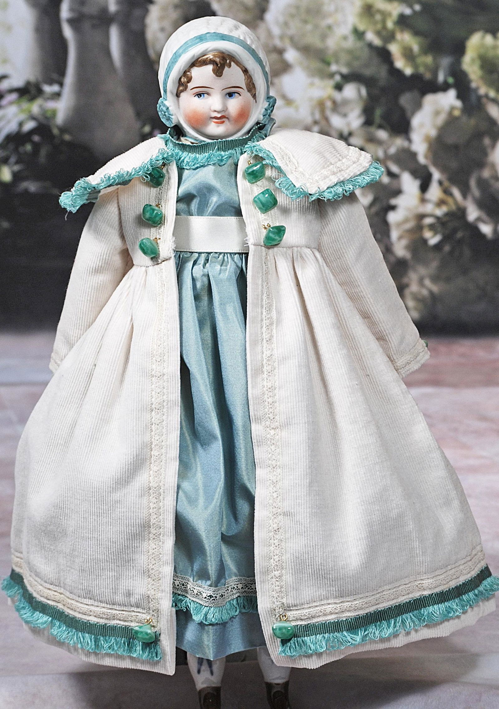 GERMAN BISQUE DOLL WITH SCULPTED BONNET (1 of 2)