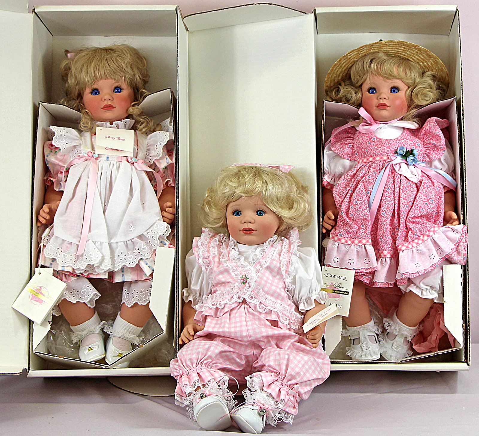 THREE SUSAN WALKEEN COLLECTION DOLLS: THREE SUSAN WALKEEN COLLECTION DOLLS. 19-20". Sweet Little Susie, Summer, and Mary Anne; Mint in box, with hand tags/COE;