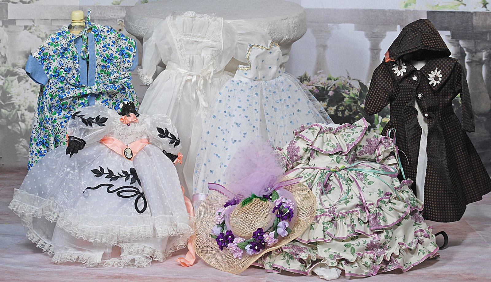 ASSORTED DOLL CLOTHES. (1 of 1)