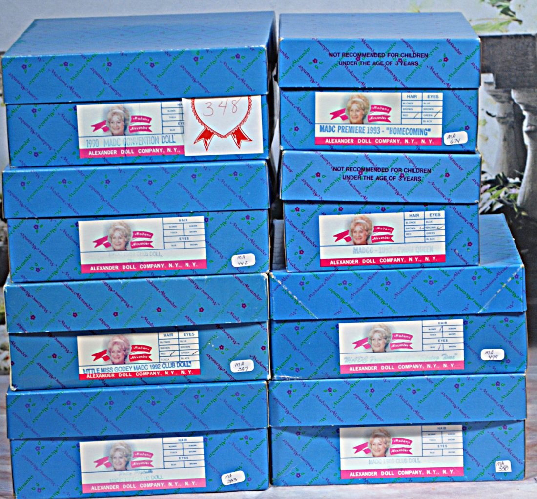 EIGHT MINT-IN-BOX MADC CLUB DOLLS. (1 of 1)