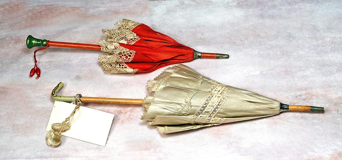 TWO WOODEN HANDLED ANTIQUE PARASOLS (1 of 1)