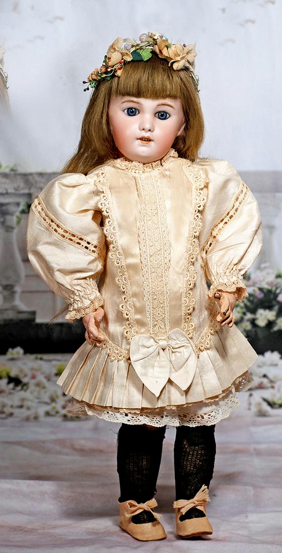 FRENCH BISQUE BEBE, 230, BY S. F. B. J. WITH JUMEAU: FRENCH BISQUE BEBE, 230, BY S. F. B. J. WITH JUMEAU BODY. 20”. Marks: SFBJ 230 Paris (embossed seal) plus red Tete Jumeau stamp. Bisque socket head, blue paperweight eyes, painted lashes, feathered 