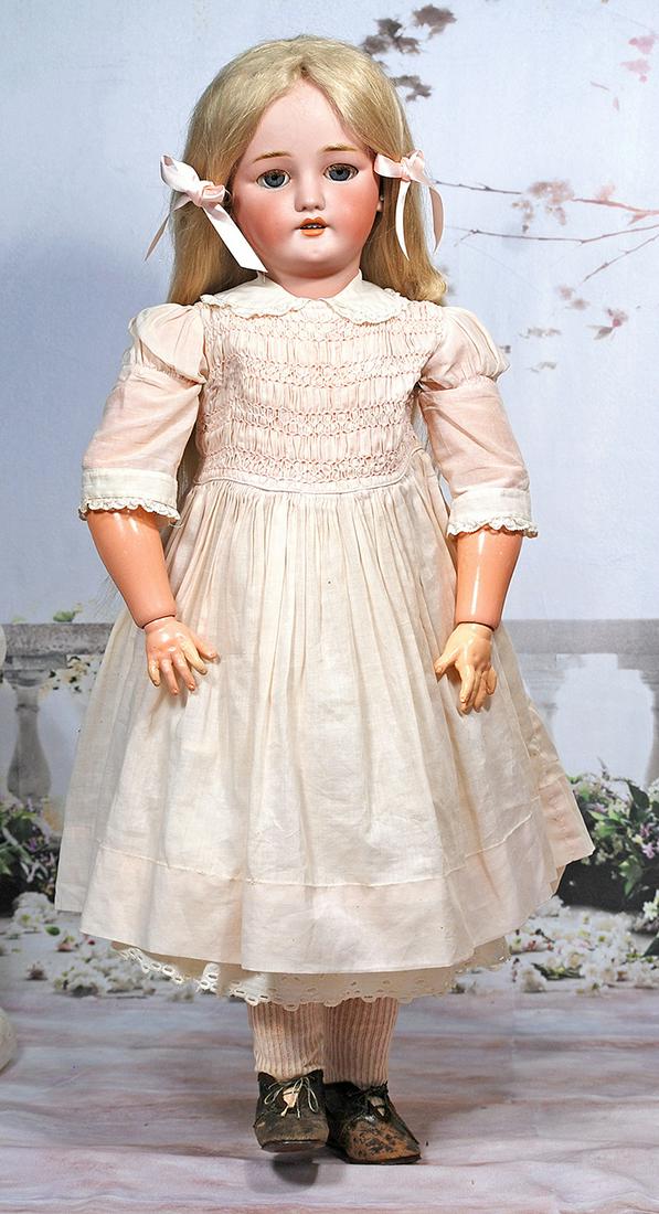 LARGE GERMAN BISQUE CHILD BY SIMON & HALBIG: LARGE GERMAN BISQUE CHILD BY SIMON & HALBIG. 30”. Marks. C. M. Bergmann/ Simon & Halbig 13 ½. Bisque socket head, blue sleep eyes, applied upper lashes, painted lower lashes, feathered brows, pierc