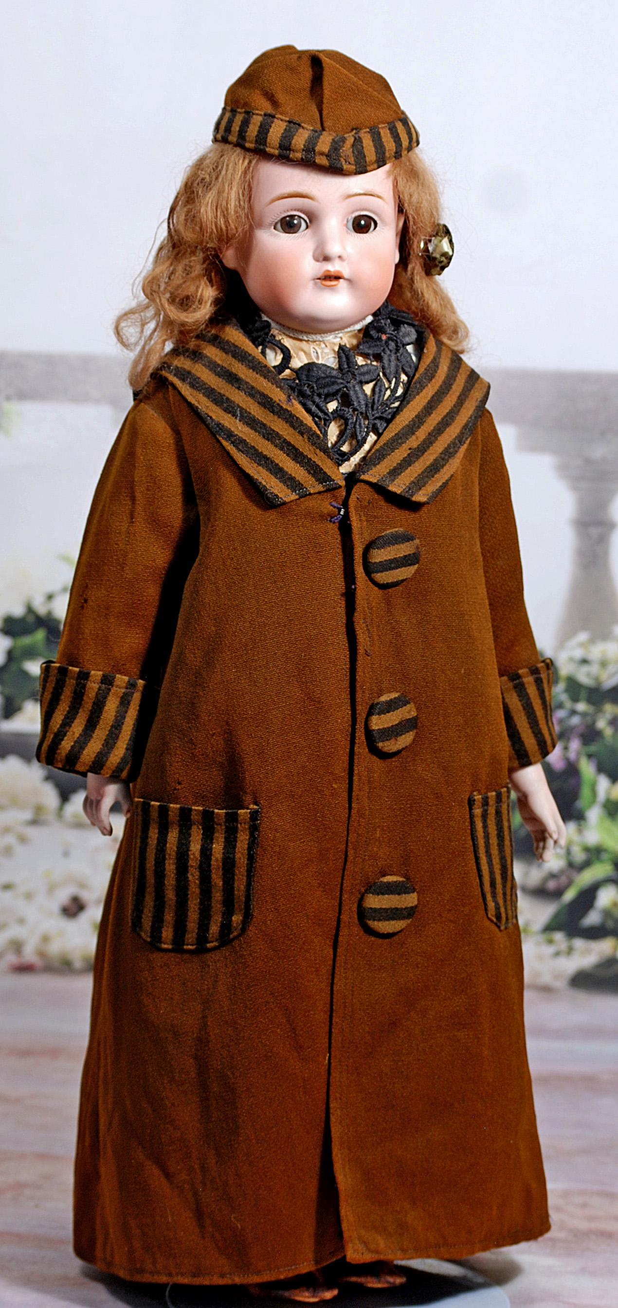 GERMAN BISQUE CHILD BY KESTNER: GERMAN BISQUE CHILD BY KESTNER. 19”. Marks: Dep 7 ½ 154. Bisque shoulderhead, brown sleep eyes, painted lashes, brows, open mouth, upper teeth, original wig and plaster pate, kid body with composit