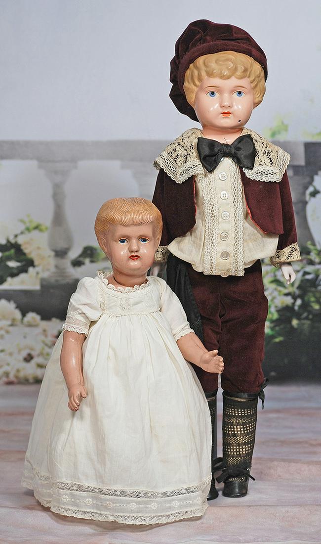 TWO METAL HEAD DOLLS (1 of 1)