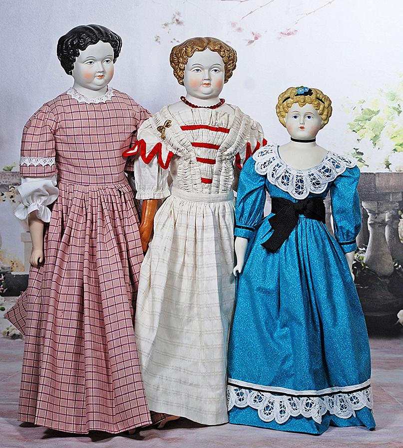 THREE BISQUE REPRODUCTION  DOLLS (1 of 1)