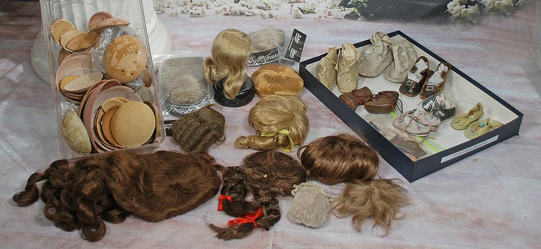 LOT OF DOLL WIGS, PATES, AND SHOES (1 of 1)