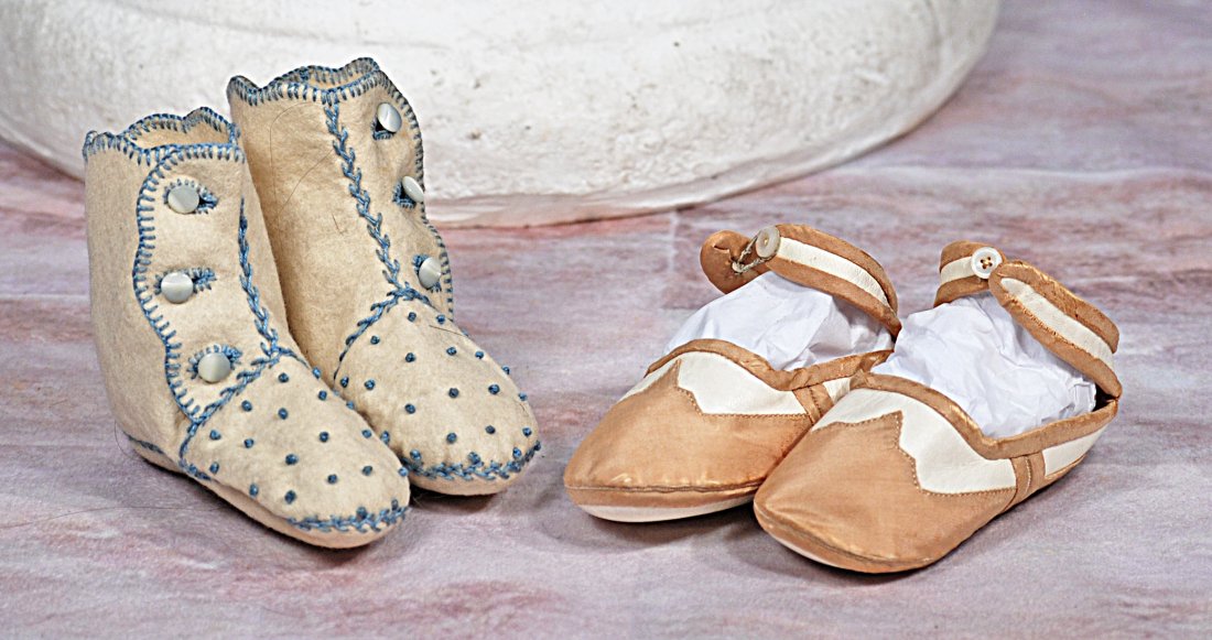 PAIR OF WOOL BOOTS AND LEATHER SHOES: PAIR OF WOOL BOOTS AND LEATHER SHOES. Ivory wool boots blue feather-stitching and decorative stitching, side button closing, 4-inch length; pair of white and tan leather shoes , ankle strap closing, 4