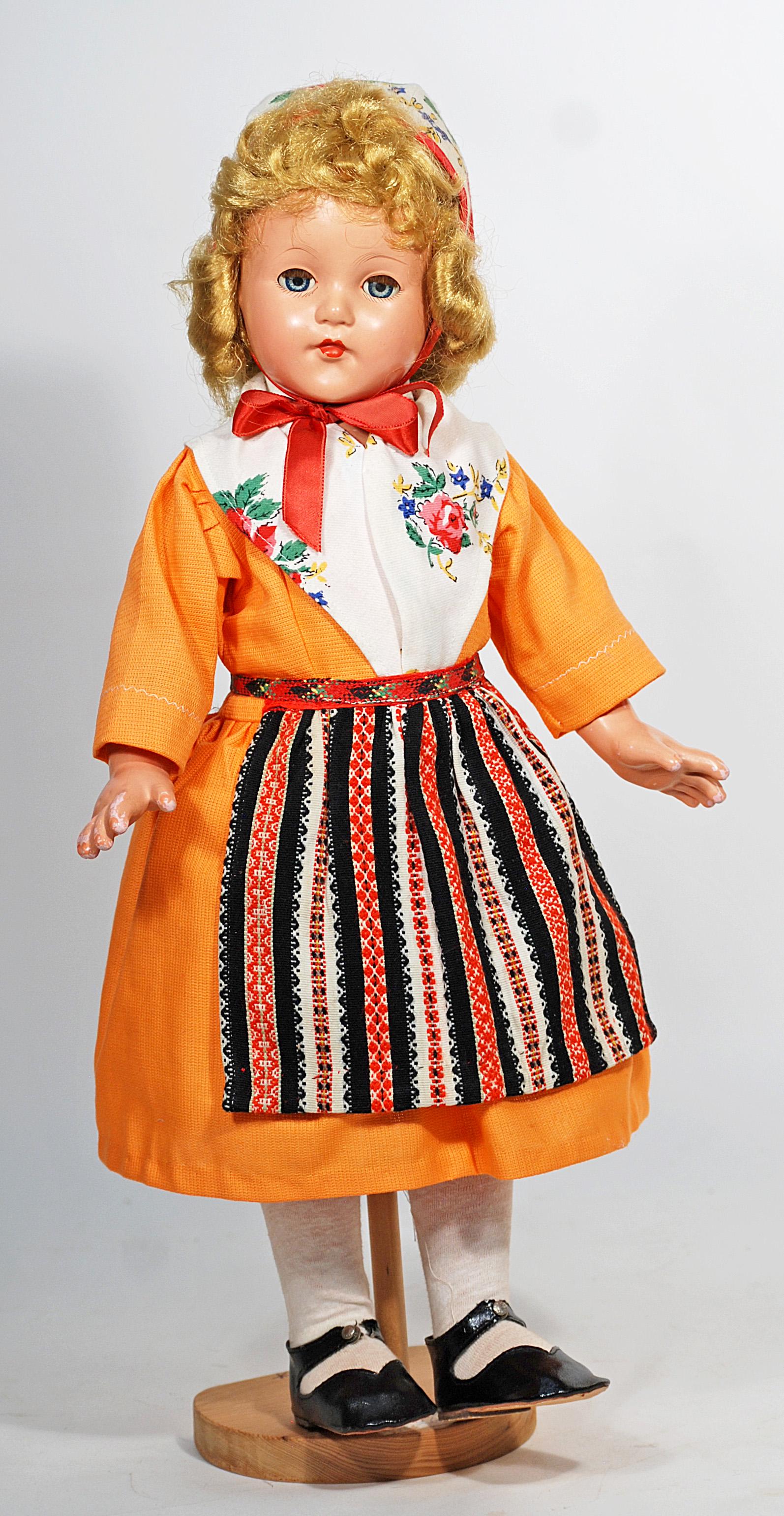 EFFANBEE HARD PLASTIC ANNE SHIRLEY IN PROVINCIAL: EFFANBEE HARD PLASTIC ANNE SHIRLEY IN PROVINCIAL COSTUME. 20”. Marks: Effanbee Anne Shirley. Hard plastic socket head, five-piece jointed body, blonde synthetic wig, sleep eyes, closed mouth, dresse