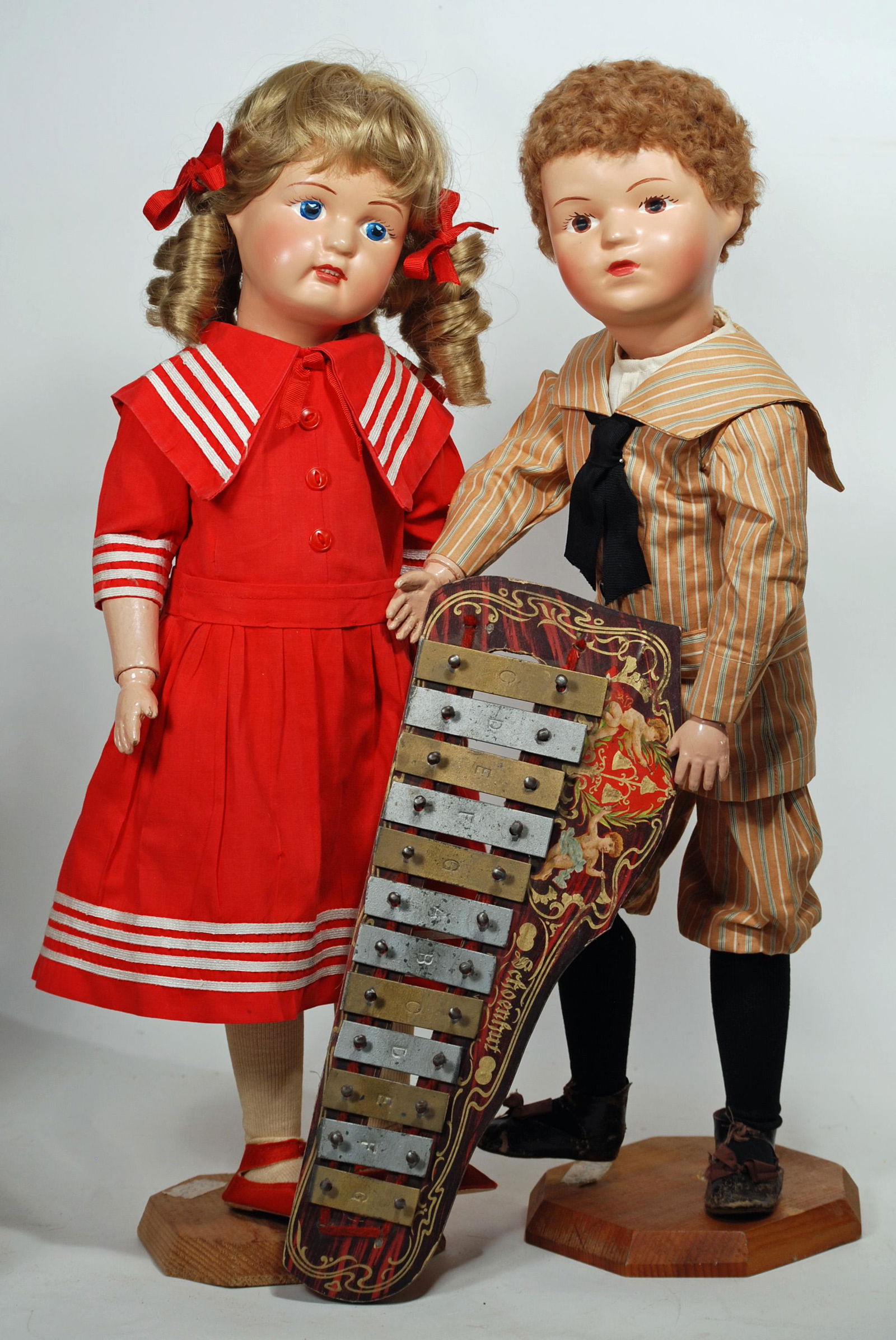 TWO CARVED WOODEN DOLLS BY SCHOENHUT & SCHOENHUT (1 of 2)