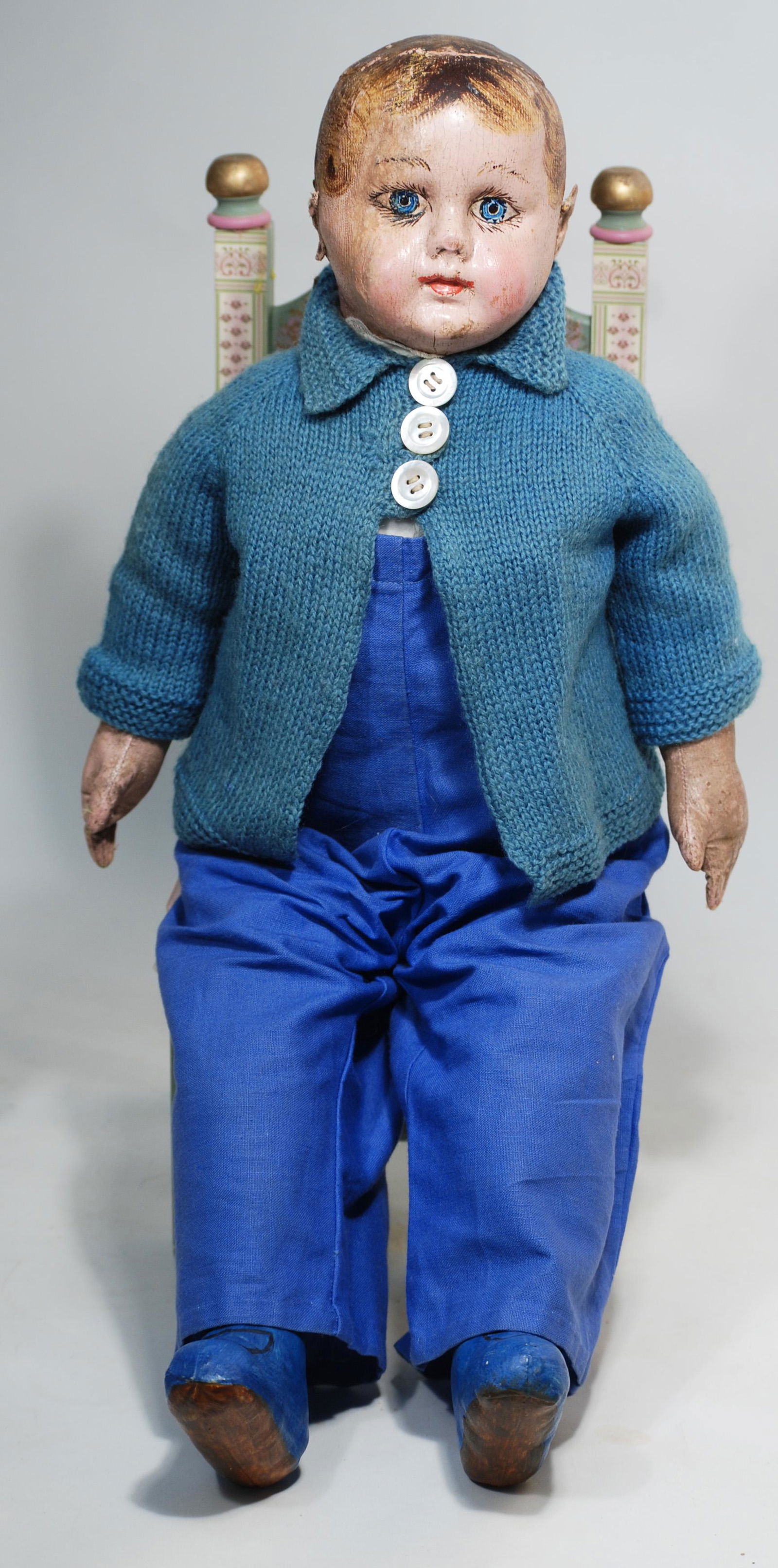 ALABAMA BABY WITH AQUA BLUE EYES: ALABAMA BABY WITH AQUA BLUE EYES. 23”. All-cloth doll with painted complexion, pressed and oil-painted features, oil-painted brown hair, painted aqua blue eyes with eyeliner and painted dark lashes,