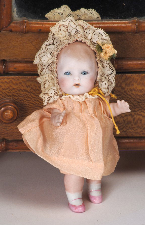 ABY BO-KAYE ALL-BISQUE DOLL BY ALT, BECK & GOTTSCHA: ABY BO-KAYE ALL-BISQUE DOLL BY ALT, BECK & GOTTSCHALCK. Marks: None. 5". Bisque swivel head on five-piece jointed bisque toddler body, molded and painted light brown hair, blue sleep eyes, painted las