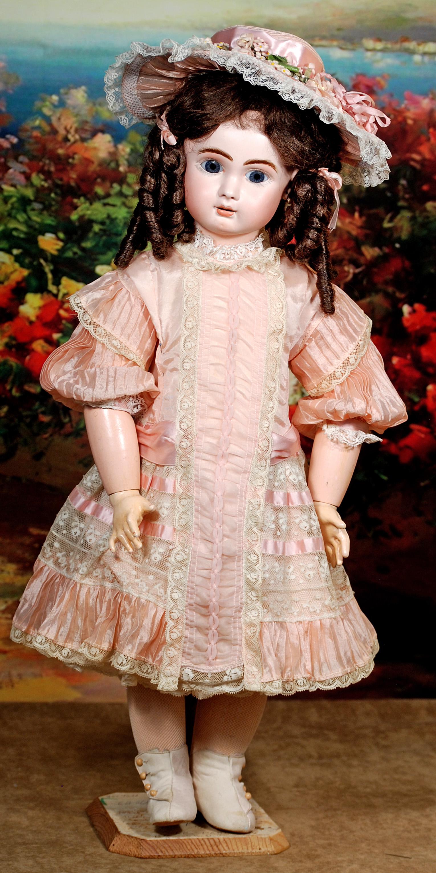 PRETTY STEINER FRENCH BISQUE BEBE WITH LEVER-OPERATED: PRETTY STEINER FRENCH BISQUE BEBE WITH LEVER-OPERATED EYES. 24". Marks: A-13 (incised); Le Parisien Bte SGDG A-15 (black stamp). Bisque socket head, lever-operated blue sleep eyes, painted lashes, ros