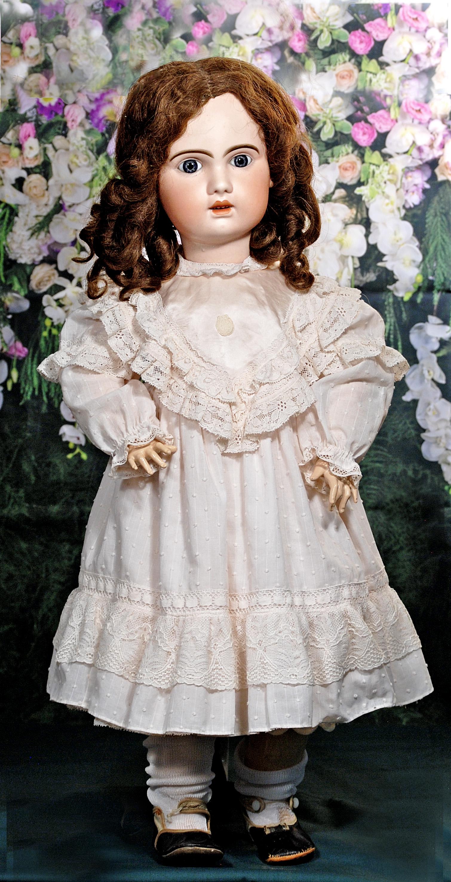LARGE JUMEAU 1907 BEBE: LARGE JUMEAU 1907 BEBE. 29". Marks: 1907/ 14. Bisque socket head, blue paperweight eyes, painted lashes, eyeliner, feathered and brushstroked brows, pierced ears, open mouth, shaded and accented lips,
