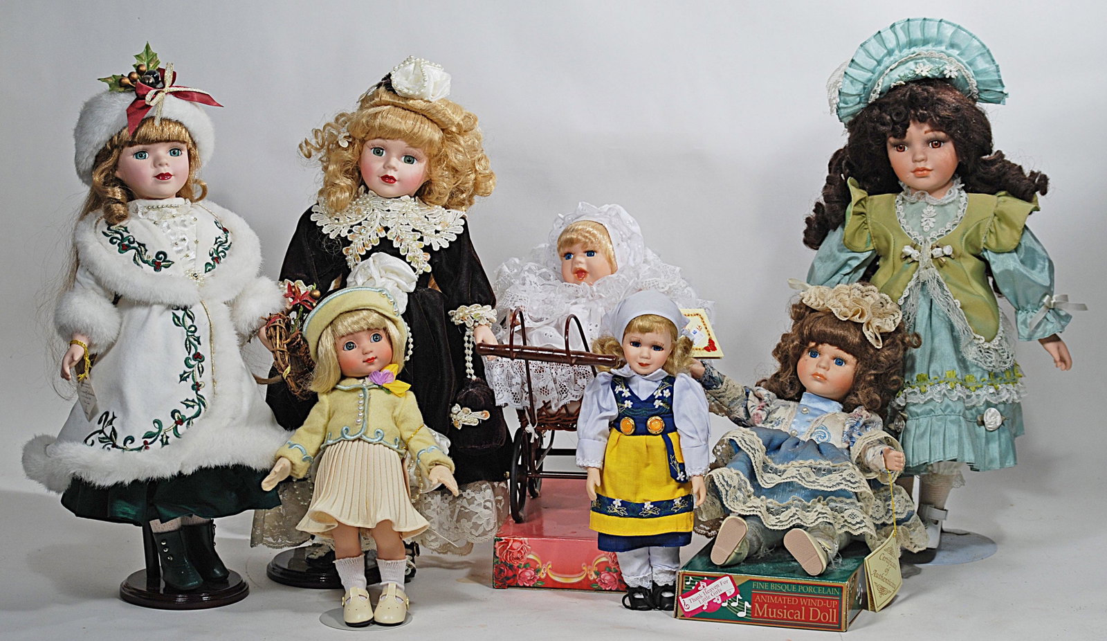 ANN ESTELLE BY MARY ENGLEBRET & SIX VICTORIAN PORCELAIN: ANN ESTELLE BY MARY ENGLEBRET & SIX VICTORIAN PORCELAIN COLLECTOR DOLLS. All in excellent condition.