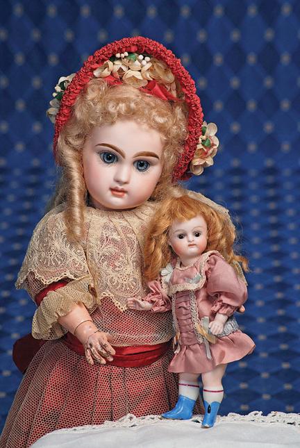 FRENCH BISQUE BLUE-EYED TETE JUMEAU BEBE. Marks:: FRENCH BISQUE BLUE-EYED TETE JUMEAU BEBE. Marks: 4 (incised); p6 (red artist mark). 14". Bisque socket head, blue paperweight eyes, lushly-painted long eyelashes, eyeliner, feathered and brushstroked 
