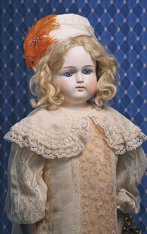 GERMAN BISQUE CLOSED MOUTH DOLL WITH PALE COMPLEX: GERMAN BISQUE CLOSED MOUTH DOLL WITH PALE COMPLEXION. Marks: None visible. 27". Solid-dome turned bisque shoulderhead, blue paperweight eyes, painted lashes, dark eyeliner, multi-stroked brows, plump 