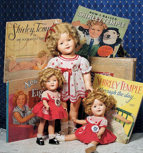 IDEAL SHIRLEY TEMPLE COMPOSITION DOLL IN "STAND U: IDEAL SHIRLEY TEMPLE COMPOSITION DOLL IN "STAND UP & CHEER" DRESS. Marks: 18 Shirley Temple, Ideal N & T (on head); Shirley Temple (on body). 18". Composition socket head on five-piece jointed body, s