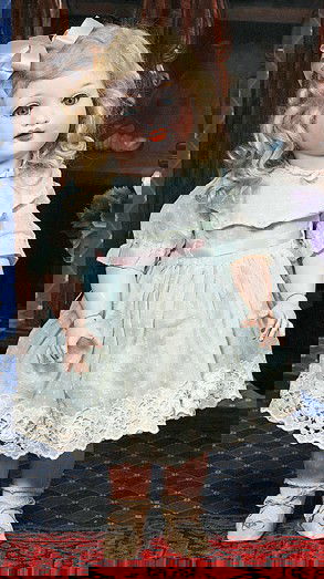 GERMAN BISQUE CHARACTER TODDLER BY MARSEILLE. Ma: GERMAN BISQUE CHARACTER TODDLER BY MARSEILLE. Marks: Germany 985 A 6 M. 18". Bisque socket head, blue sleep eyes, applied upper lashes, painted lashes, feathered brows, open mouth, shaded and accented