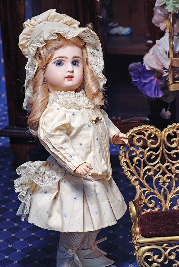 FRENCH BISQUE BEBE BY JUMEAU. Marks: Tete Jume: FRENCH BISQUE BEBE BY JUMEAU. Marks: Tete Jumeau Bte SGDG 16 ½". Bisque socket head, blue paperweight eyes, painted lashes, feathered and brushstroked brows, pierced ears, closed mouth, shaded and ac