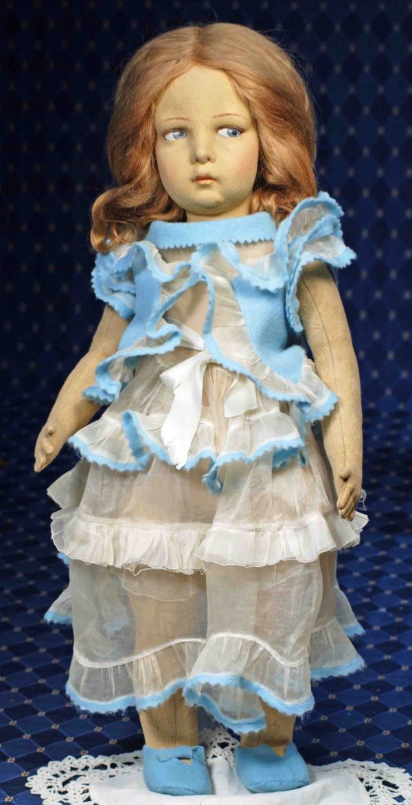 VINTAGE 1920’S, SERIES 109 LENCI FELT DOLL.: LARGE LENCI GIRL. 22”. Felt swivel head with pressed and painted facial features, blue side-glancing and deep-set eyes, upper curly eyelashes, arched and feathered brows, closed mouth, shaded lower