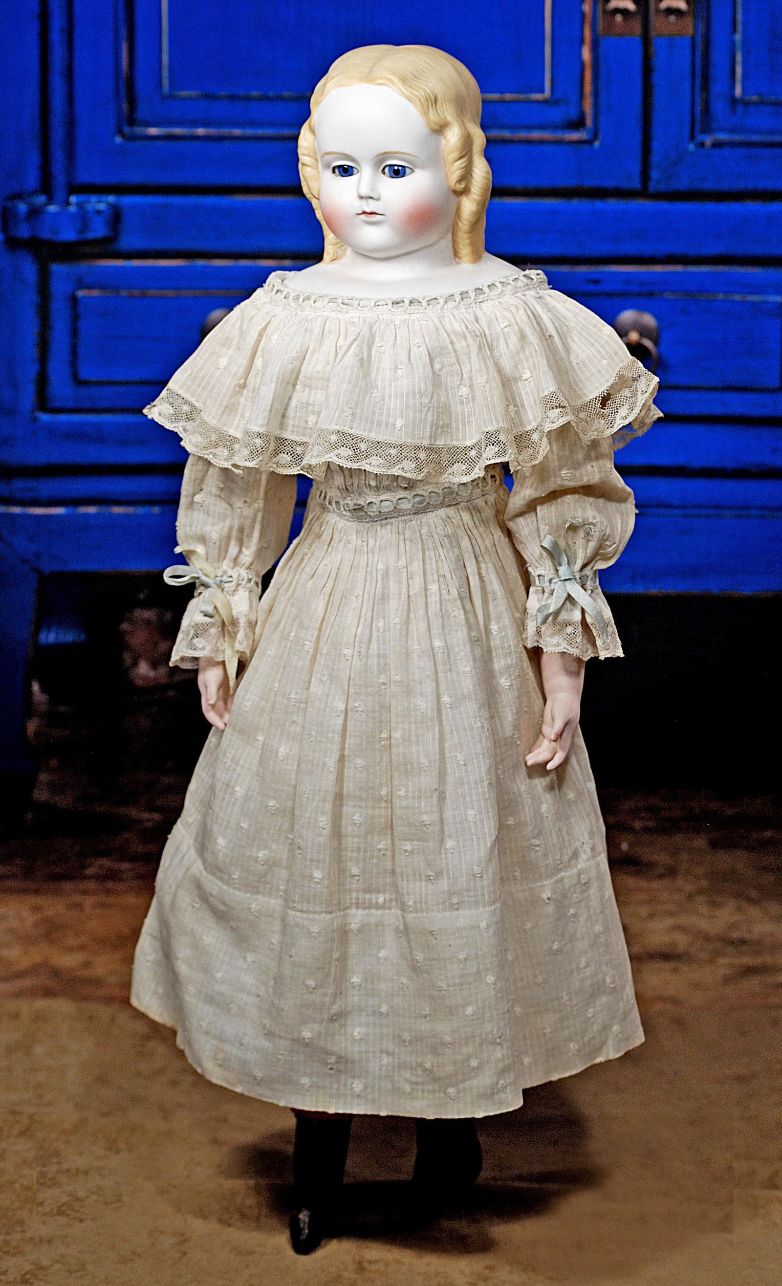 7.  GERMAN BISQUE DOLL WITH SCULPTED LONG CURLS AND (1 of 2)