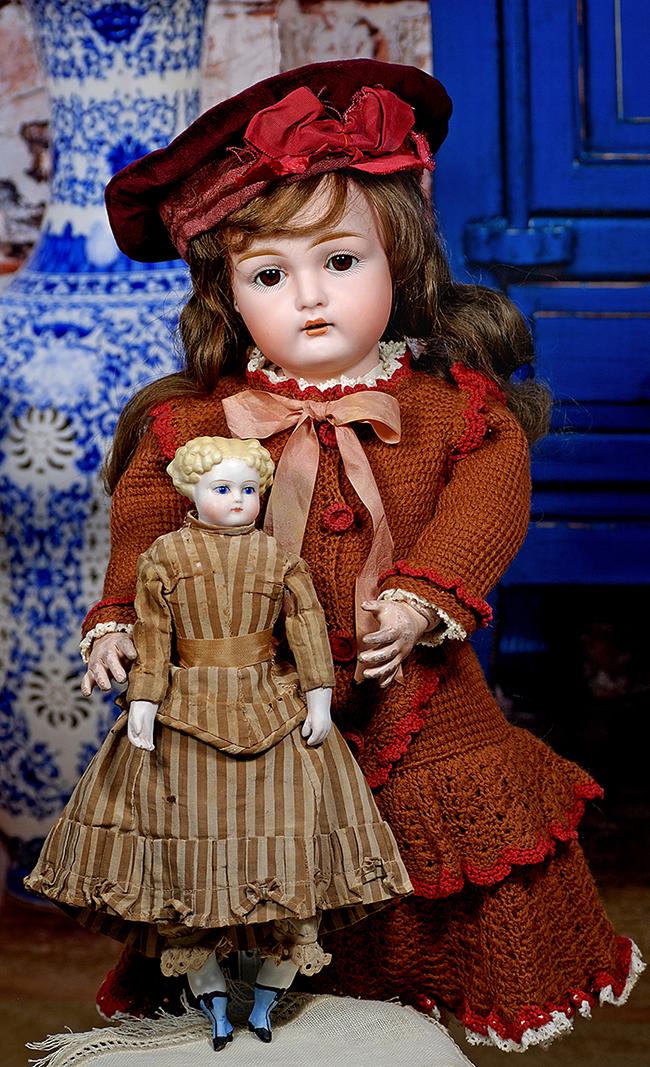 57.  PETITE GERMAN BISQUE PARIAN WITH GLASS EYES AND (1 of 2)