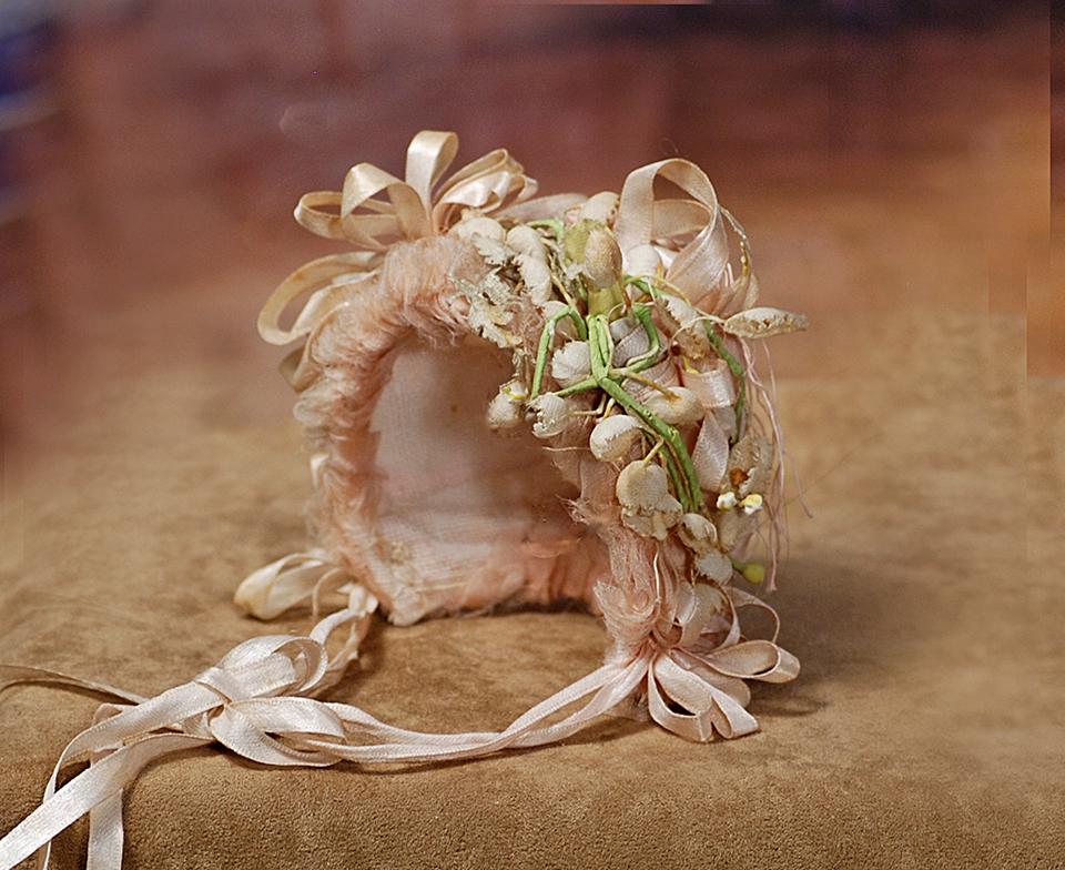 97.  SMALL DOLL BONNET WITH “AU NAIN BLEU” (1 of 1)