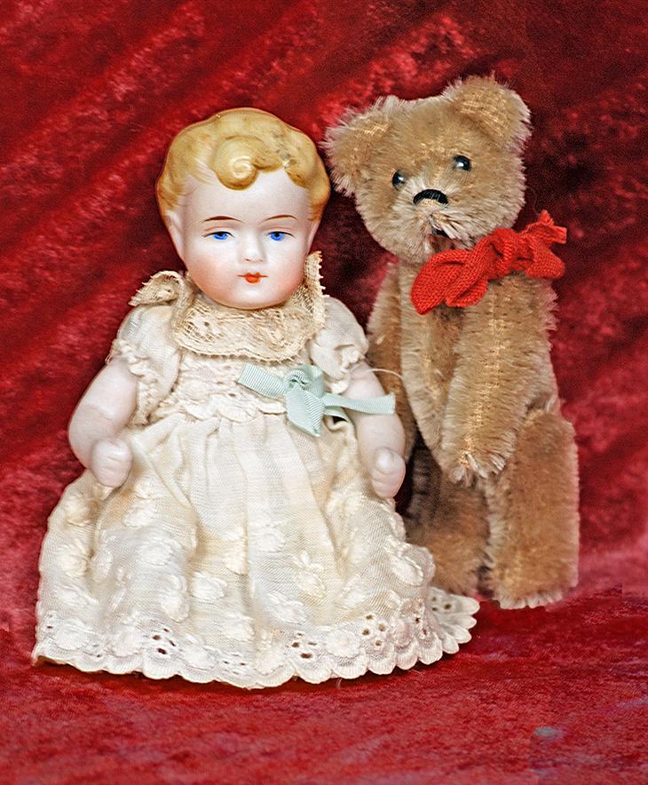 103.  TINY GERMAN ALL-BISQUE BABY AND MINIATURE SHUCO (1 of 1)