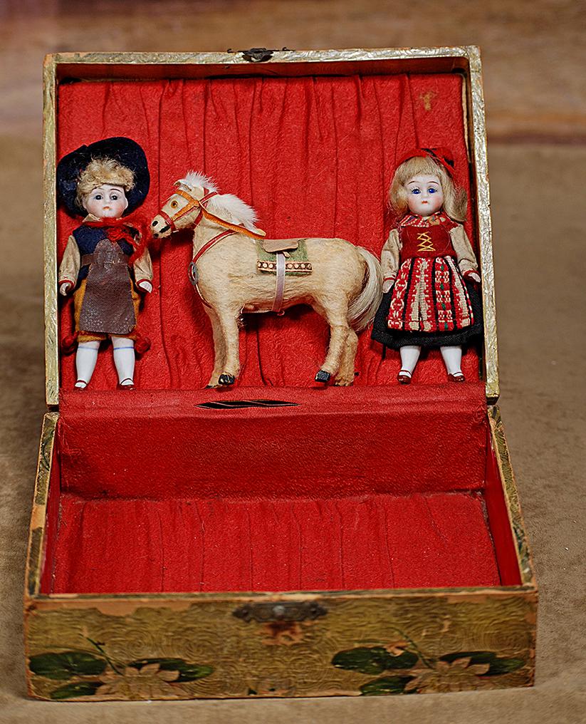 127.  PAIR OF MINIATURE GERMAN ALL-BISQUE DOLLS WITH (1 of 2)