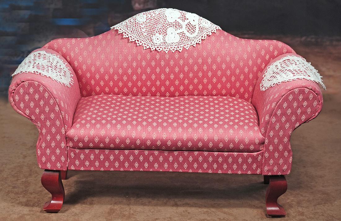 131.  CHIPPENDALE STYLE DOLL SOFA.  Wooden framed sofa (1 of 1)