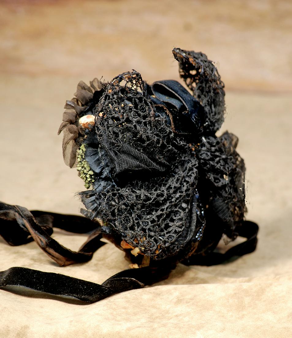 145.  ANTIQUE DOLL BONNET.  Wire-framed bonnet covered (1 of 1)