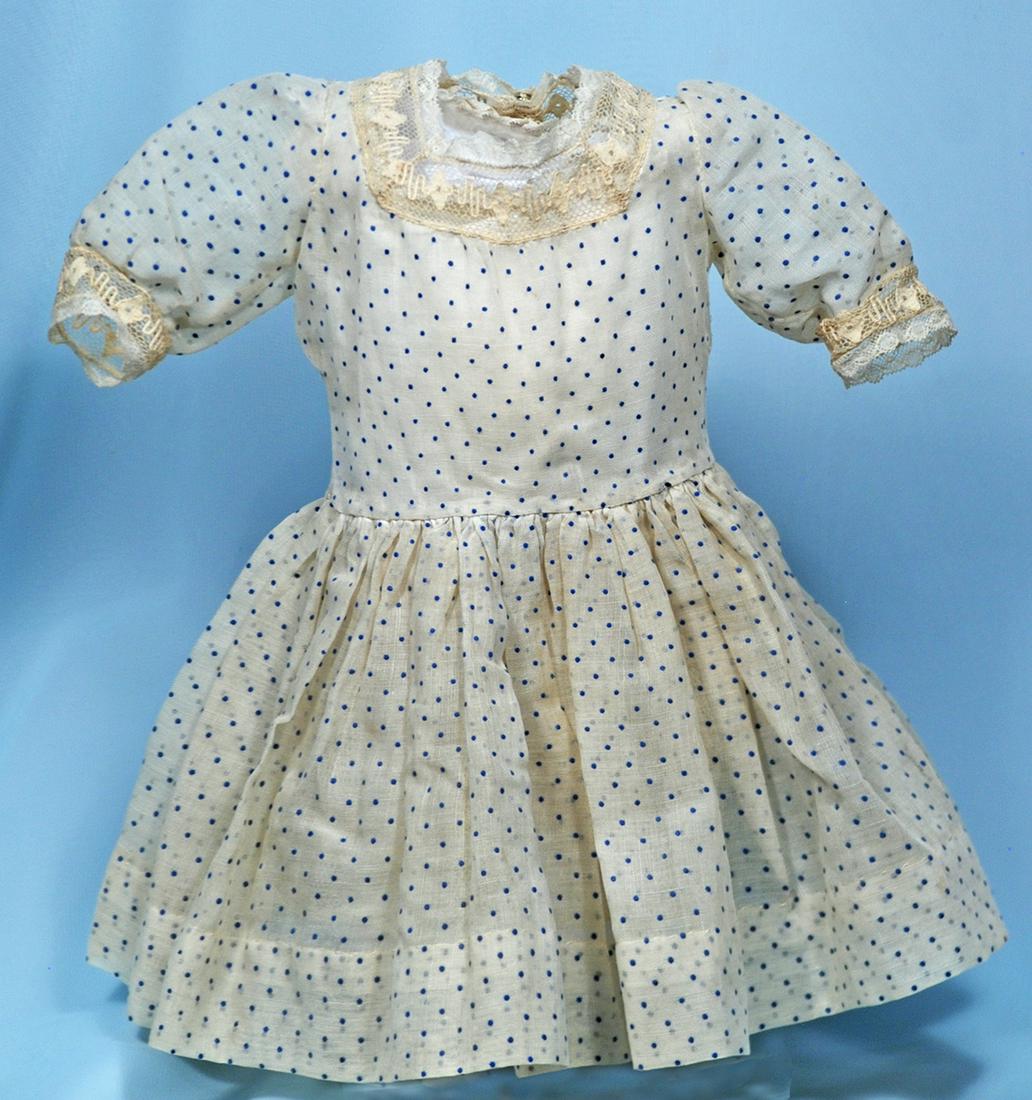 154.  COTTON DOLL DRESS WITH BLUE POLKA DOTS.  Fine (1 of 1)