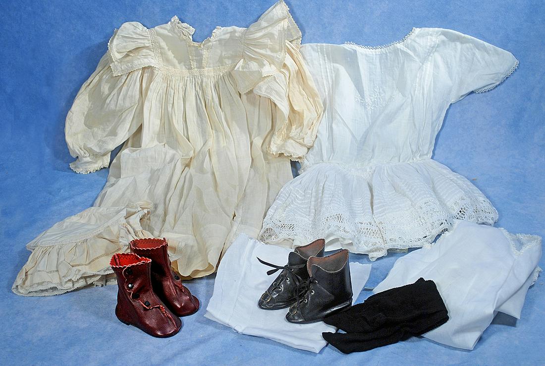 214.  DOLL CLOTHING.  Includes: 18” and  22” (1 of 1)