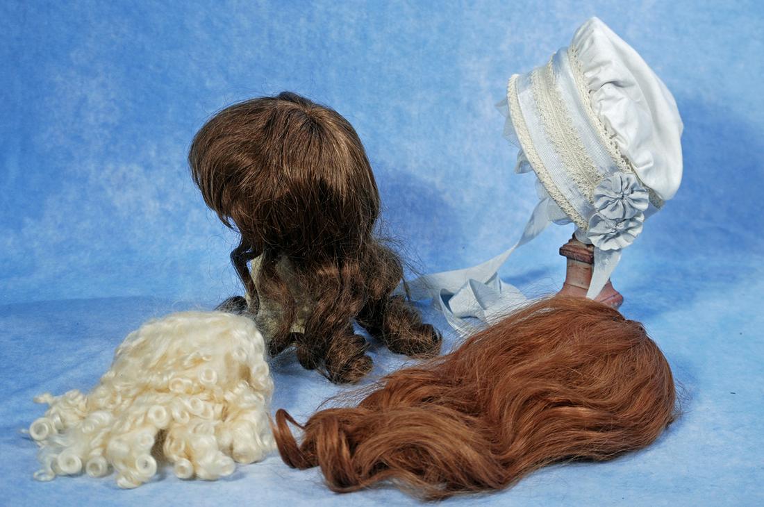 217.  THREE DOLL WIGS AND ONE BONNET.  Size 14 to 17 (1 of 1)