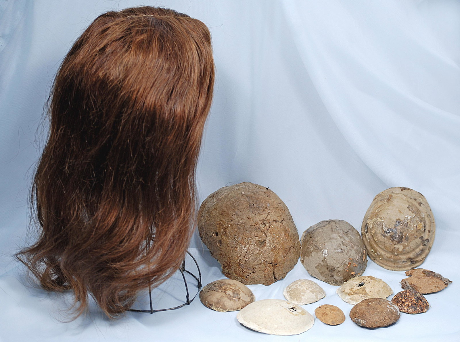 250-A.  DOLL WIG AND PATES.  Twelve antique pates (1 of 1)