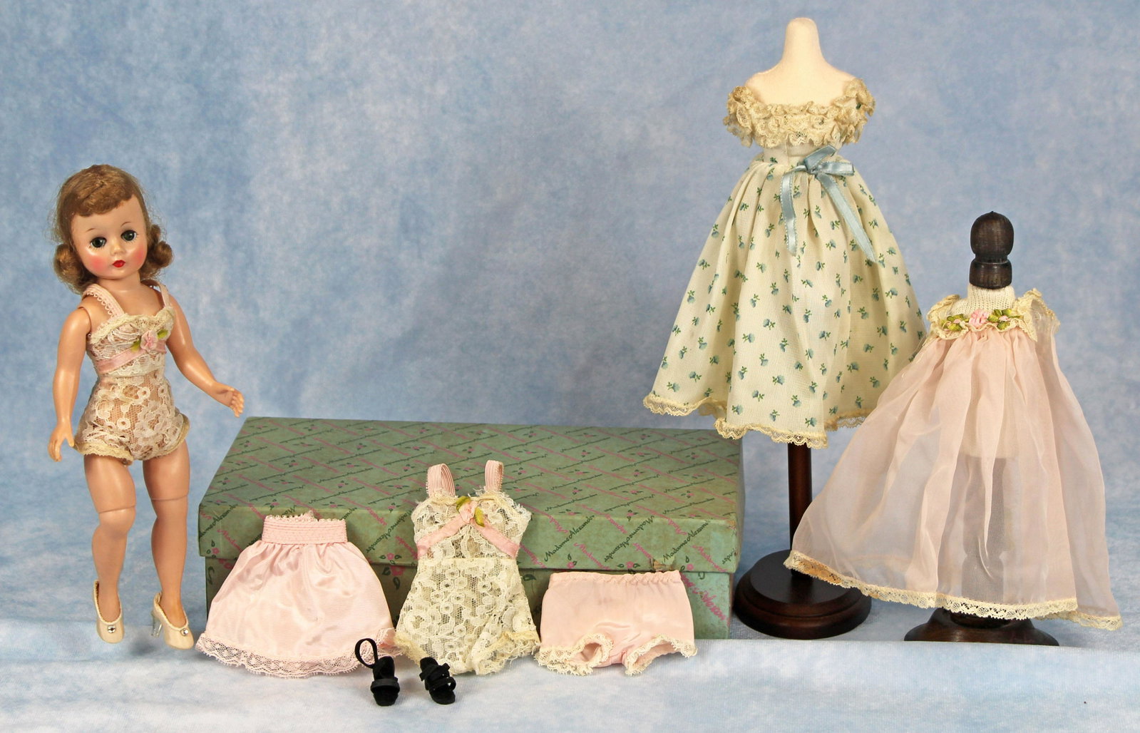 283. VINTAGE CISSETTE WITH EXTRA WARDROBE. : 283. VINTAGE CISSETTE WITH EXTRA WARDROBE. 10”. . Hard plastic with socket head, adult-lady body, sleep eyes, blonde hair, tagged chemise, high heels. Plus additional chemise, one pink nigh