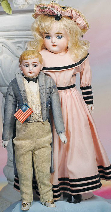 GERMAN BISQUE DOLL BY KESTNER. Marks: G. 16". Tu: GERMAN BISQUE DOLL BY KESTNER. Marks: G. 16". Turned bisque shoulderhead with large blue sleeping eyes, painted lashes, molded and feathered brows, open mouth, shaded lips, upper teeth, antique blonde