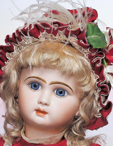 JUMEAU'S BLUE-EYED "BEBE LOUVE" FRENCH BISQUE BEB: JUMEAU'S BLUE-EYED "BEBE LOUVE" FRENCH BISQUE BEBE. Marks: B 10 L. 23". Bisque socket head, blue paperweight eyes, painted lashes, feathered and brushstroked brows, pierced ears, shaded and accented l