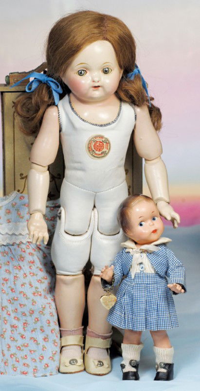 EARLY EFFANBEE COMPOSITION DOLL. Marks: Effanbee: EARLY EFFANBEE COMPOSITION DOLL. Marks: Effanbee (back shoulders); Effanbee 100% American, Genuine Kid Body (chest sticker). 16". Composition shoulderhead, blue/gray sleep eyes, painted lashes, tapere