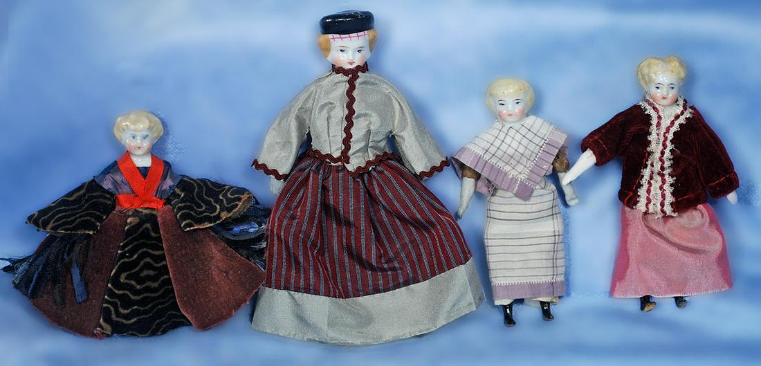 FOUR GERMAN PORCELAIN DOLLHOUSE DOLLS (1 of 1)