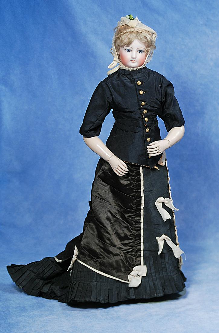 FRENCH BISQUE POUPEE WITH WOODEN ARTICULATED BODY PLUS TRUNK AND WARDROBE (1 of 4)