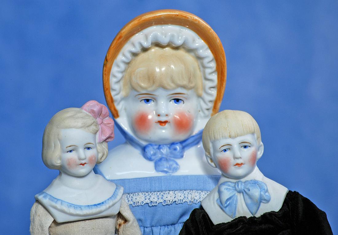 PAIR OF BISQUE CHARACTERS BY HERTWIG (1 of 2)