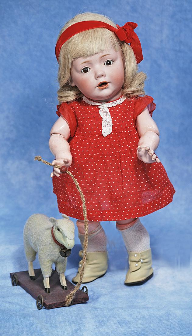 GERMAN BISQUE HILDA TODDLER BY KESTNER: 85. GERMAN BISQUE HILDA TODDLER BY KESTNER. 15”. Marks: H. made in Germany 245 JDK Jr. 214 © Hilda. Bisque socket head, brown sleep eyes, painted lashes, feathered brows, open mouth, accent