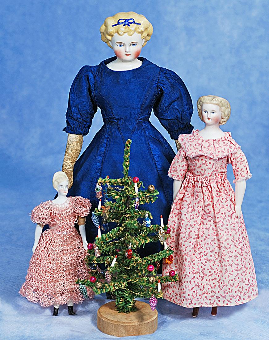 DOLL HOUSE SIZE BISQUE AND PORCELAIN DOLLS WITH CONTEMPORARY CHRISTMAS TREE (1 of 2)